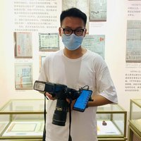按快门的丁俊杰